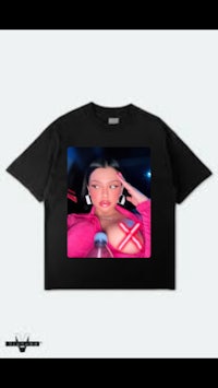 a black t - shirt with a picture of a woman on it